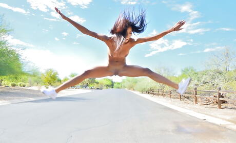 Foxy american brunette teen Nia Nacci in fancy shorts showing big hooters and ass outside