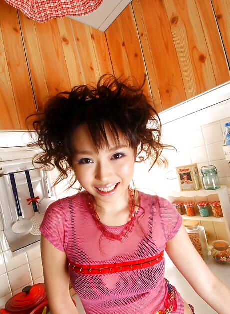 Sultry japanese Aya Shiraishi baring her butt in kitchen