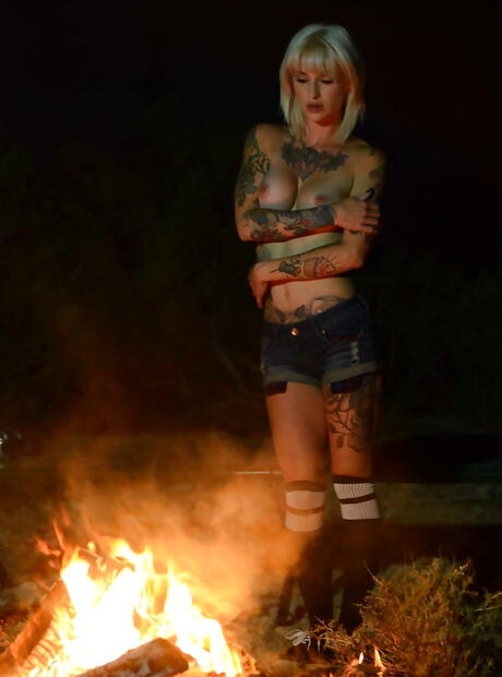 Attractive american cutie Kleio Valentien in fancy shorts posing